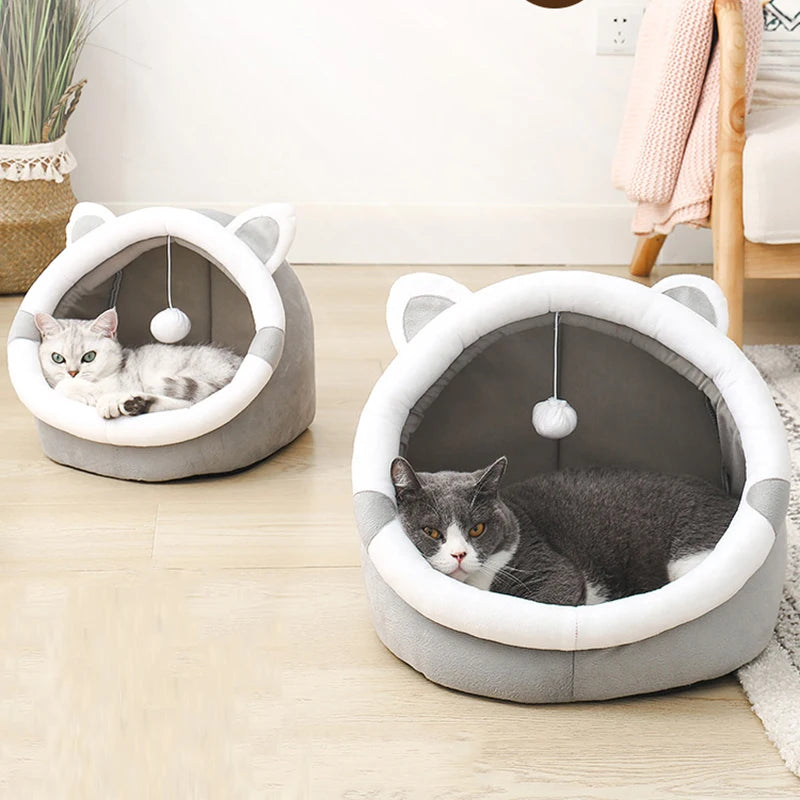PawDome cat head bed interior — soft removable cushion lining visible through wide arch opening