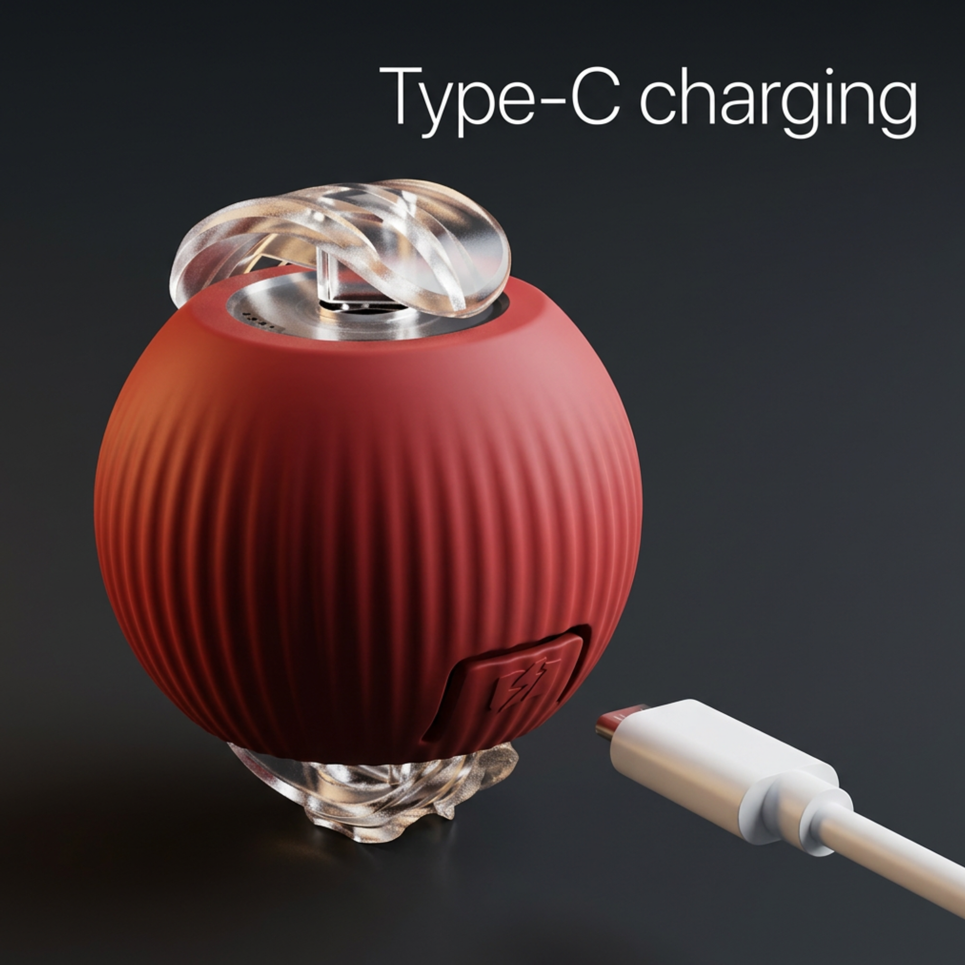 cat toy Red and clear electronic device with Type-C charging cable on a dark background