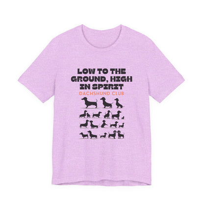 Heather Prism Lilac Dachshund Club unisex tee laid flat showing dachshund silhouette print