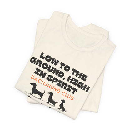Folded Natural Dachshund Club t-shirt with dachshund silhouettes design
