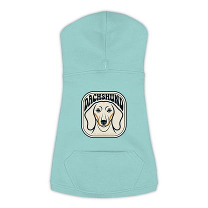 Dachshund dog hoodie in Saltwater — gold crest emblem print on cosy fleece pullover