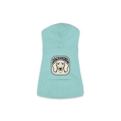 Dachshund dog hoodie in Saltwater — gold crest emblem print on cosy fleece pullover