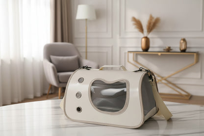 Pet carrier shaped like a spaceship on a light-colored surface