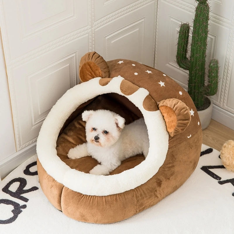 Bear cave dog bed with sherpa-lined arch entrance and removable cushion