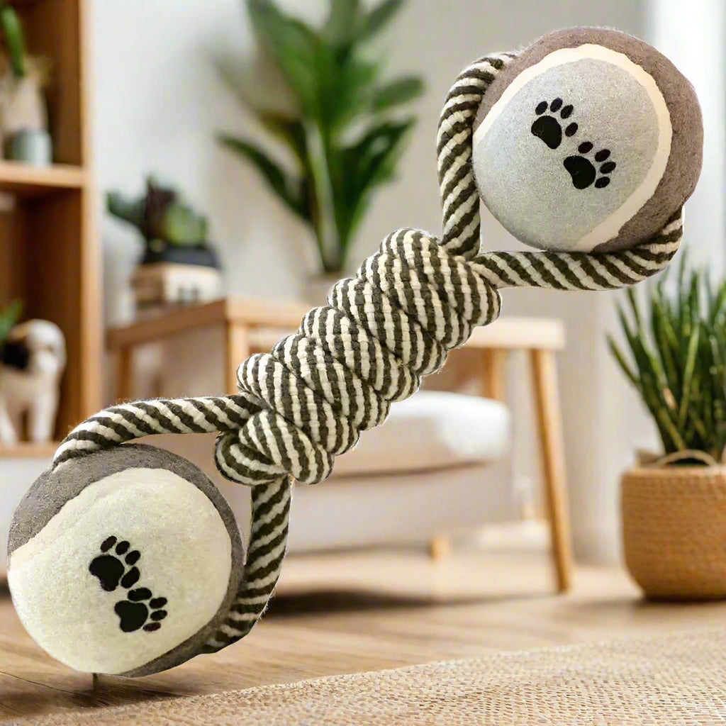 EcoTug dumbbell rope toy close-up paw-print balls twisted cotton knot centre living room