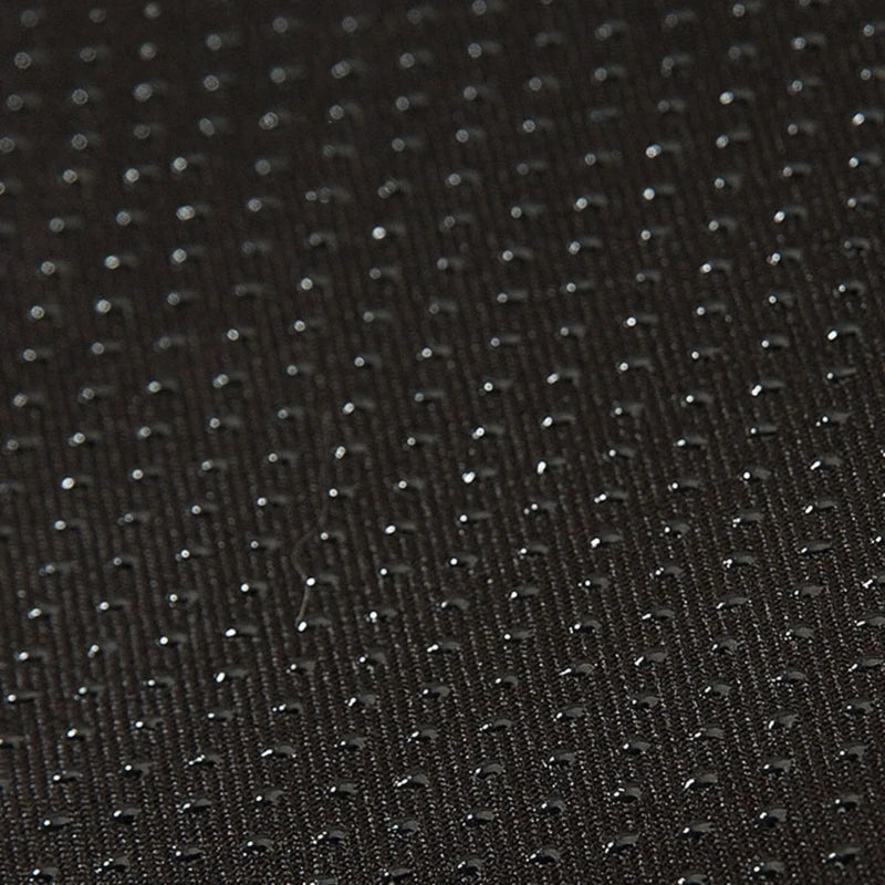 Close-up of waterproof Oxford fabric base on bear cave dog bed with water droplets