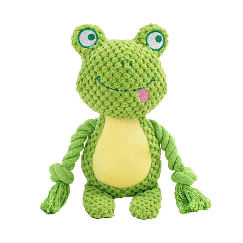 Green frog-shaped dog toy with a yellow belly on a white background