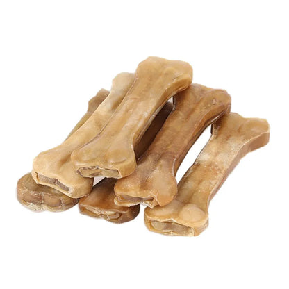 HideBone Natural Cowhide Bone Dog Chew — size comparison S to XL — SniffWaggleNWalk