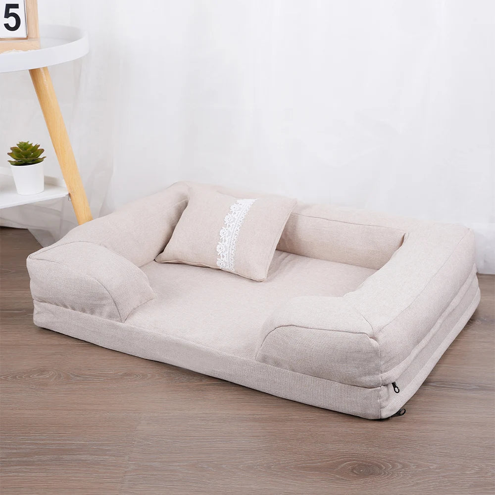 Dog resting on apricot linen sofa lounger bed with lace cushion — Sniff Waggle And Walk