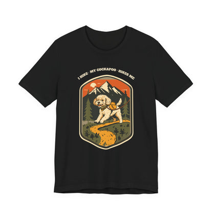 Close-up of the I Hike My Cockapoo Hikes Me print on a black tee