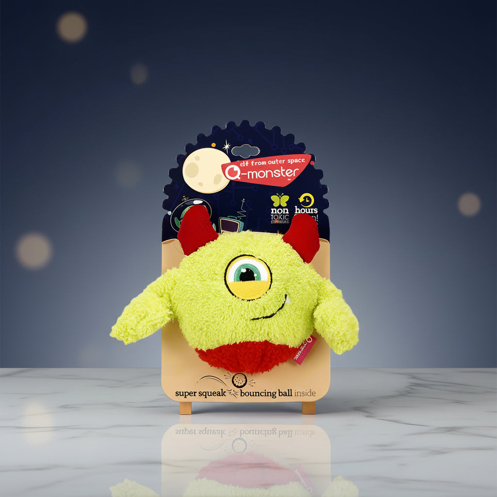 Green Q-Monster plush squeaky dog ball with one-eyed monster character design — SniffWaggleNWalk QMonster™