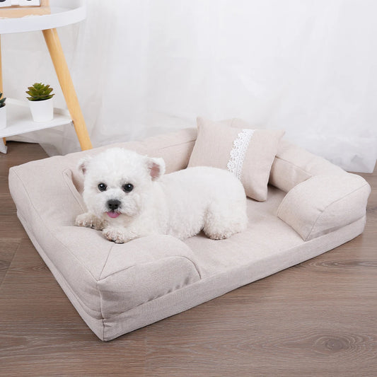 Side view of low bolster back and side rests on linen sofa lounger dog bed — Sniff Waggle And Walk