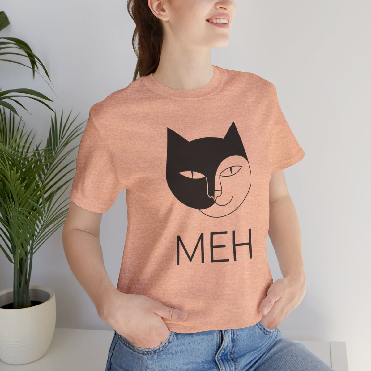 Meh Cat minimalist t-shirt in heather peach, front view