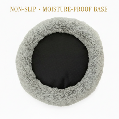 Non-slip moisture-proof base of PawCave™ cat cave bed showing paw print embroidery