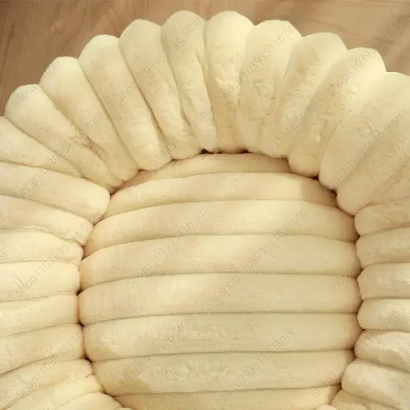 Close-up of cream ribbed faux rabbit-fur plush pet bed showing individual tube construction