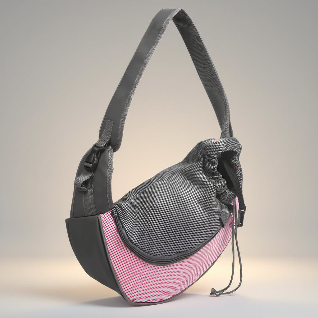 Pink hands-free pet sling carrier with breathable mesh and padded shoulder strap for cats and small dogs under 10 lb.