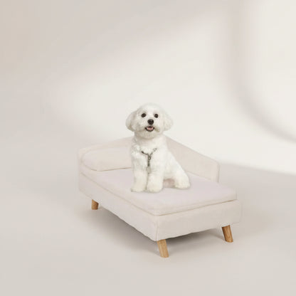 Corgi dog resting on PawSofa cream pet sofa in modern living room