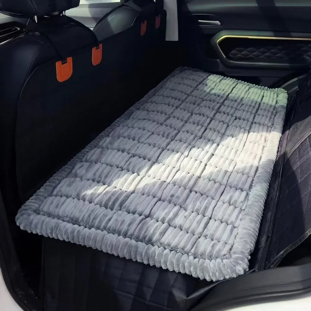 Close-up of soft plaid flannel material of pet bed mat