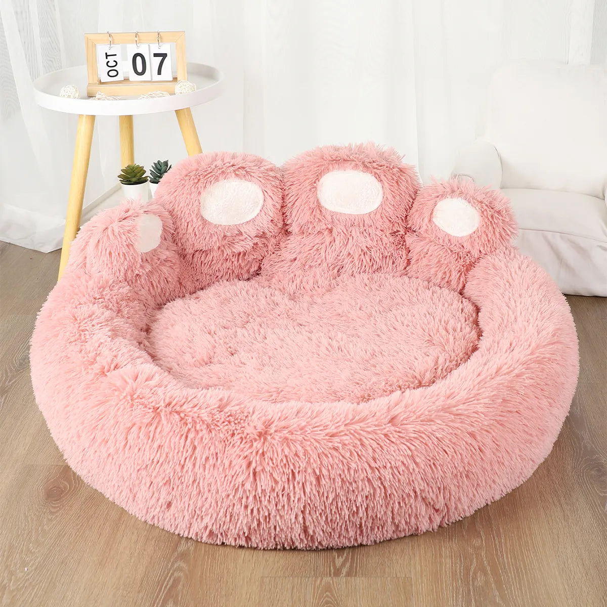 Labrador relaxing in PoshPup PawCloud bear paw plush dog bed in pink — SniffWaggleNWalk