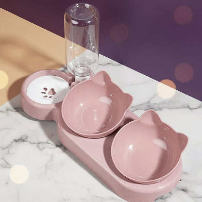 Pink pet bowl set with a water bottle on a beige background