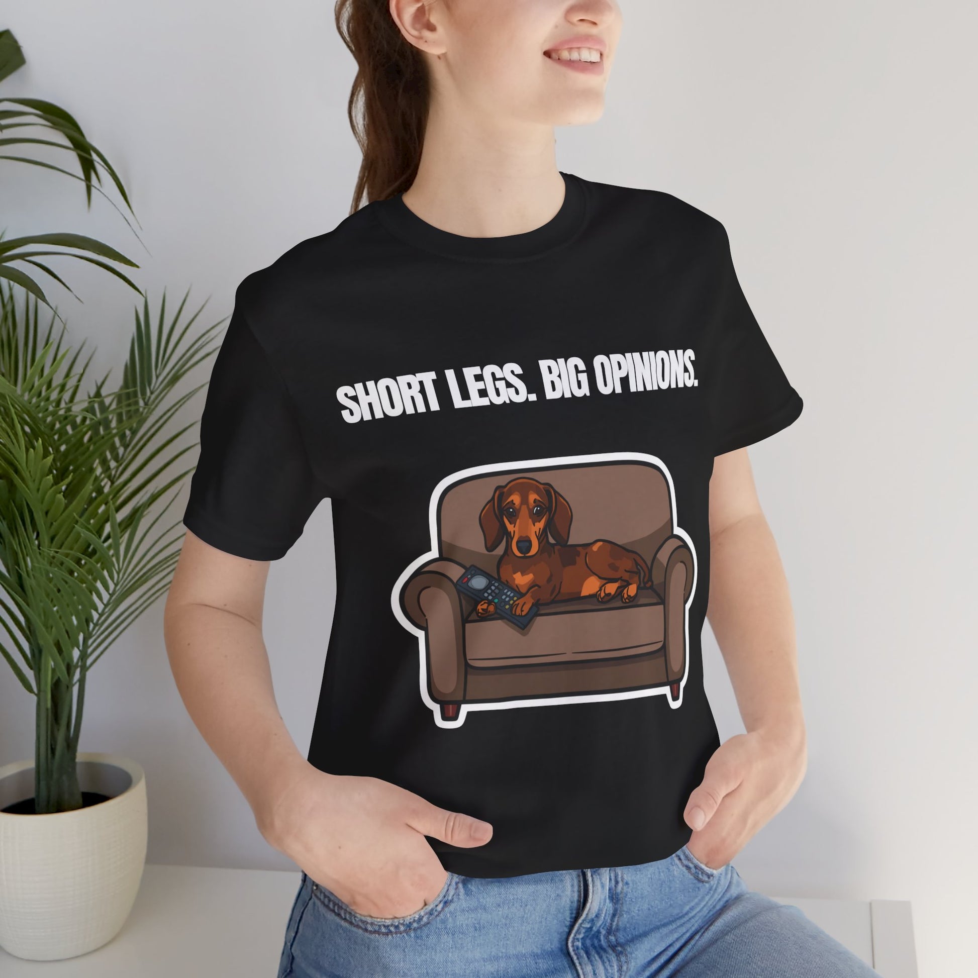 Short Legs. Big Opinions. Dachshund t-shirt — front view on model
