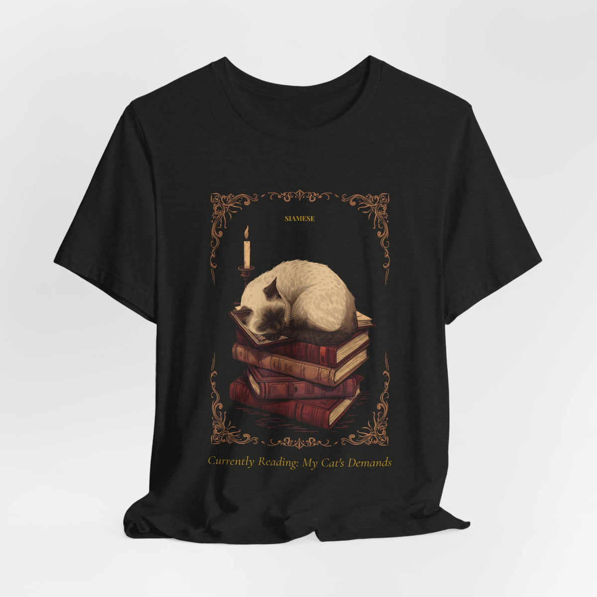 Lifestyle photo of the Siamese Cat reading tee