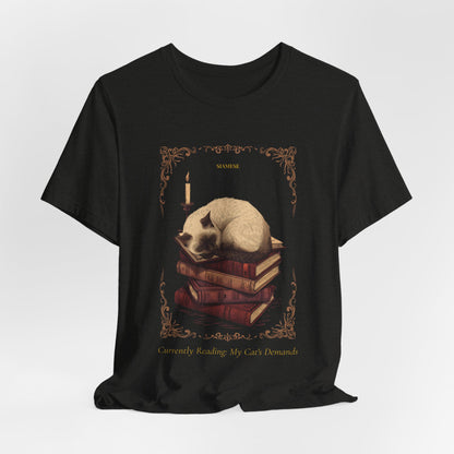 Lifestyle photo of the Siamese Cat reading tee