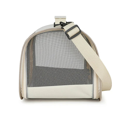 Beige pet carrier with mesh side on a white background