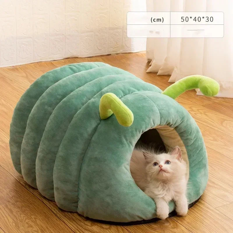 PawWorm orange caterpillar bed with small dog inside — plush tunnel entrance detail
