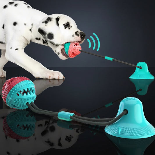 SniffWaggleNWalk SuctionPup slow feeder ball and rope dog toy — Turquoise and Red colour variants on a smooth floor.