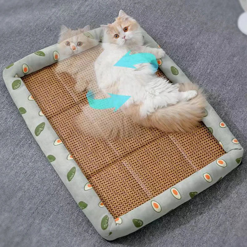 Cat lying on ChillTail avocado print rattan cooling mat, stretching out on cool surface