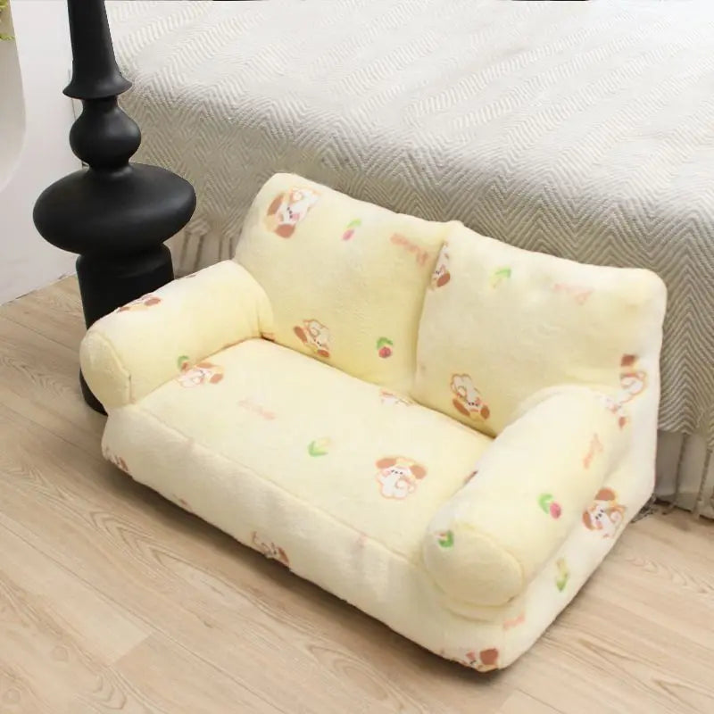 Pet sofa bed in yellow cartoon dog print and blue bunny print — both sizes on wooden floor — SniffWaggleNWalk