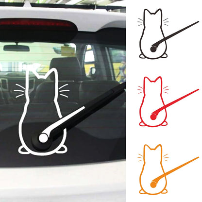 hite cat wagging tail car sticker on a hatchback rear window with the tail piece installed on the wiper.