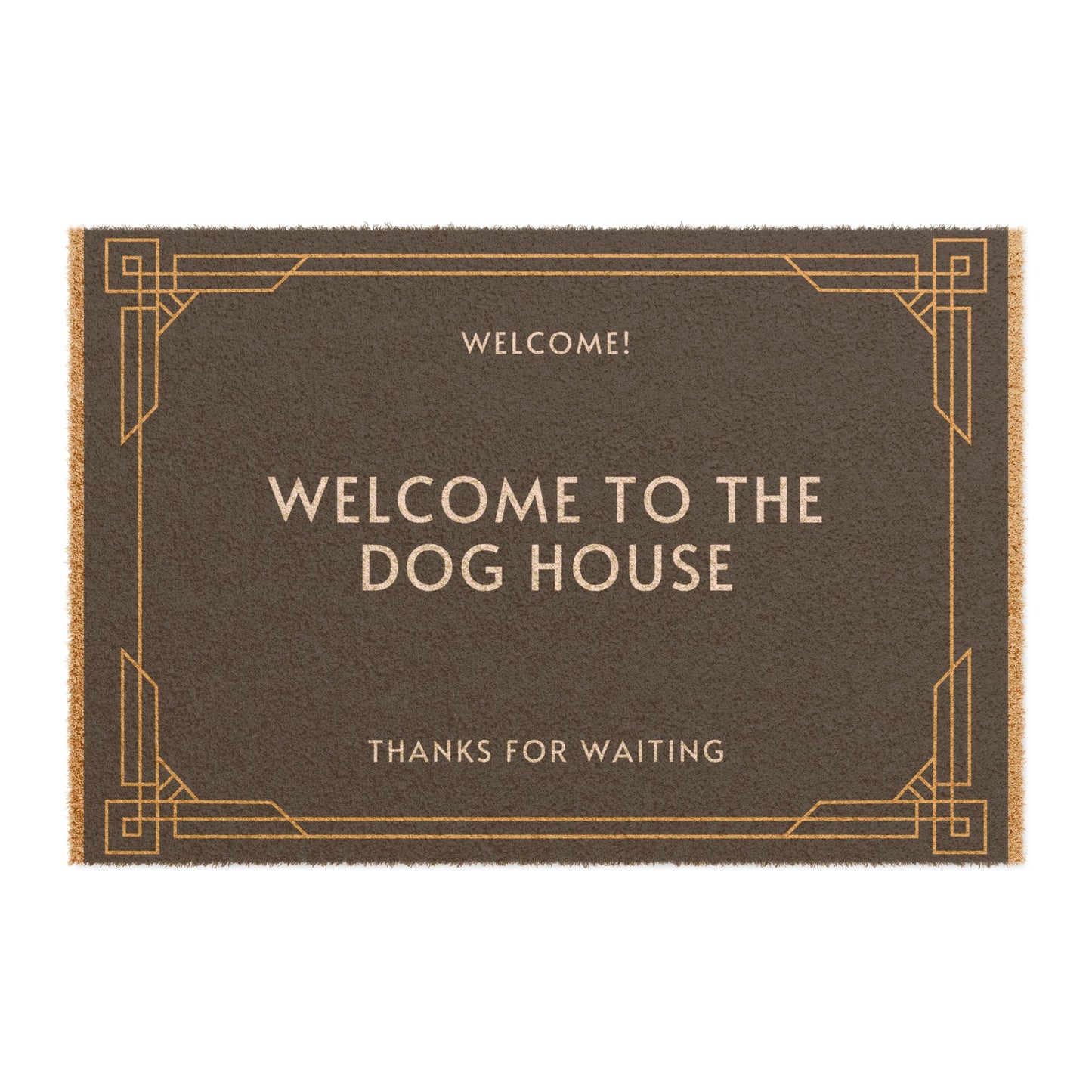 A brown coir doormat with a black vinyl backing, featuring the text 'WELCOME TO THE DOG HOUSE' in capital letters on a plain background.
