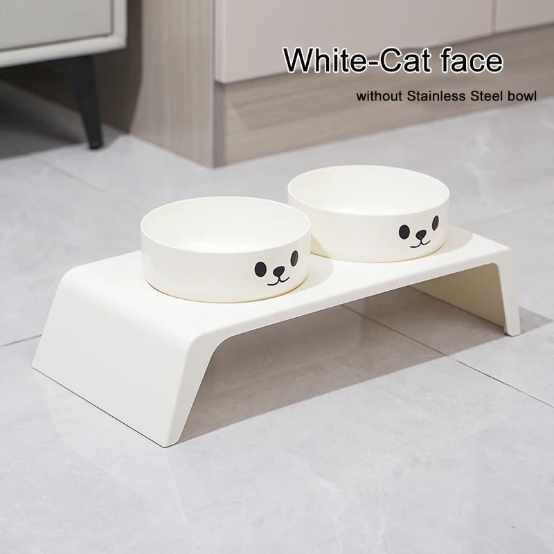 White pet bowl stand with two bowls on a tiled floor.