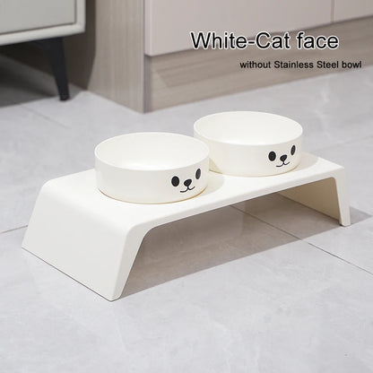 White pet bowl stand with two bowls on a tiled floor.